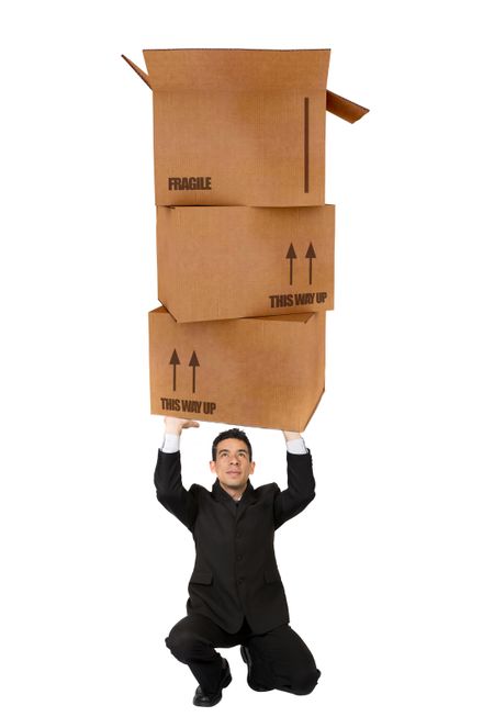 Business man holding cardboard boxes isolated   on white