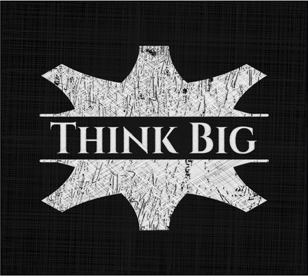 Think Big chalkboard emblem written on a blackboard