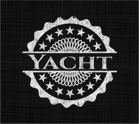 Yacht chalk emblem written on a blackboard