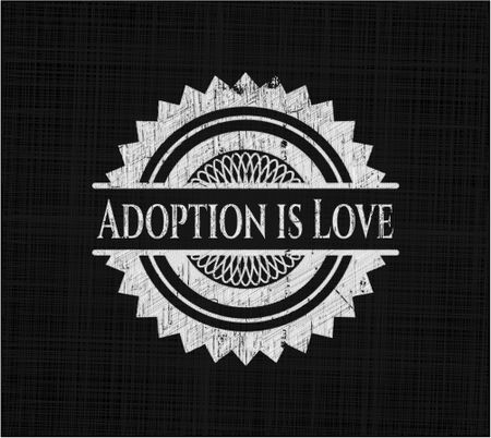 Adoption is Love written on a chalkboard