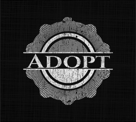 Adopt written with chalkboard texture