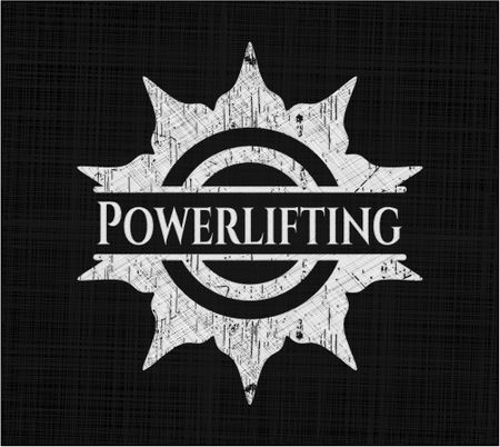 Powerlifting written on a blackboard