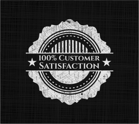 100% Customer Satisfaction chalk emblem written on a blackboard