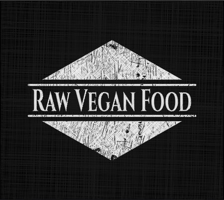 Raw Vegan Food chalkboard emblem written on a blackboard