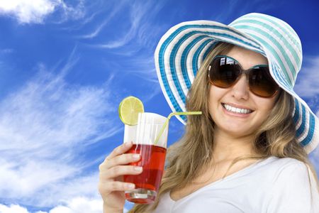 Summer woman with hat and a drink outdoors