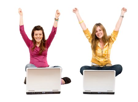 online success of some casual girls with laptops isolated