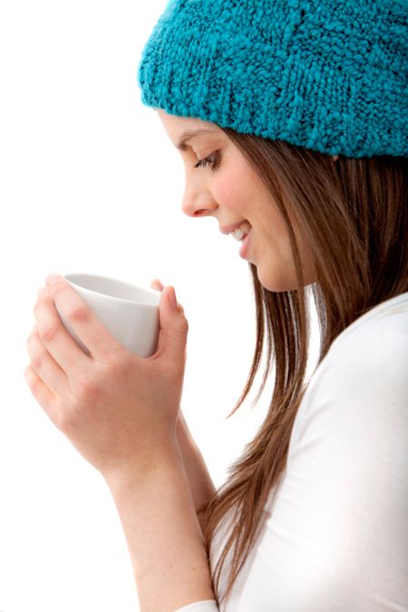 Woman portrait with a hot drink isolated on white