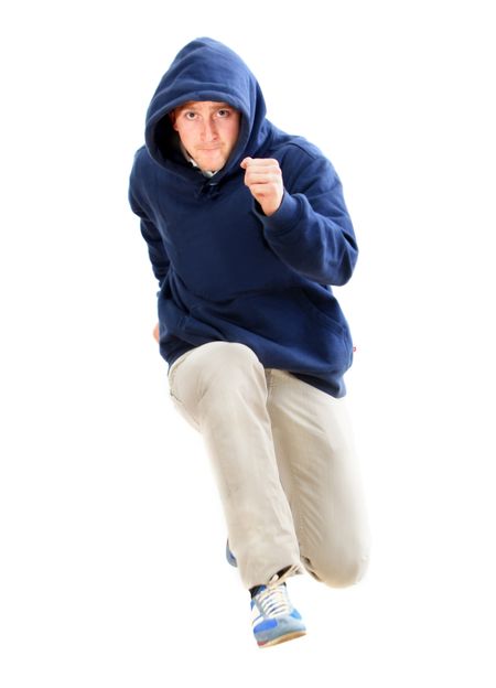 Casual man running isolated over a white background
