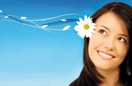 Woman portrait smiling with a flower on her head