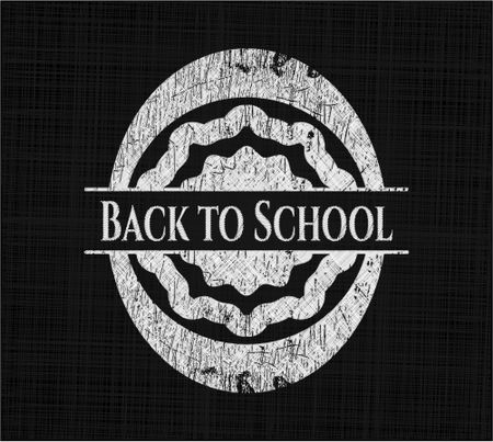 Back to School chalkboard emblem written on a blackboard