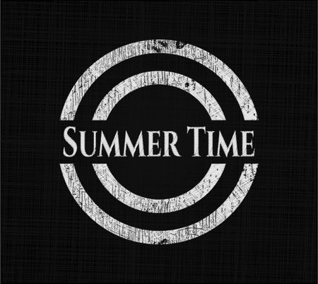 Summer Time chalk emblem written on a blackboard