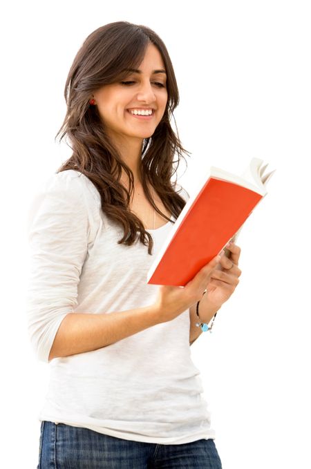 Beautiful casual woman reading a book isolated on white