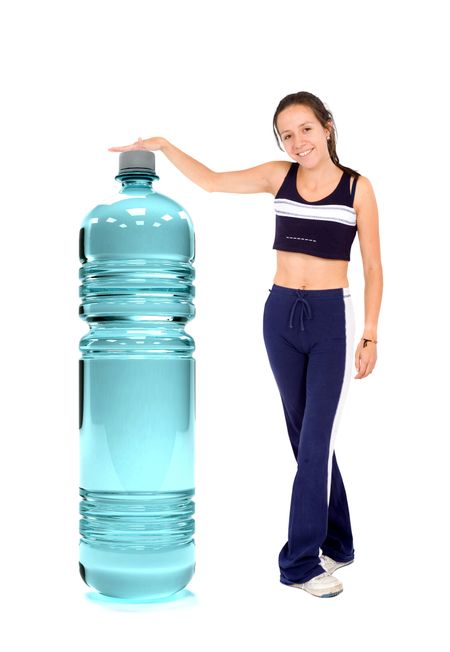 Gym woman with a bottle of water isolated on white