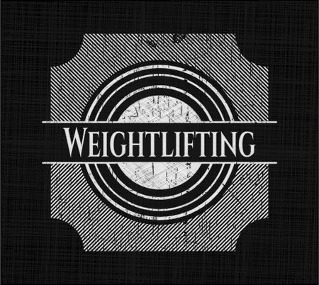 Weightlifting chalkboard emblem written on a blackboard