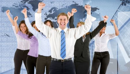 Happy business team with arms up smiling
