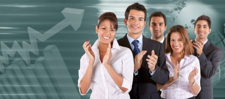 Happy young business team applauding and smiling