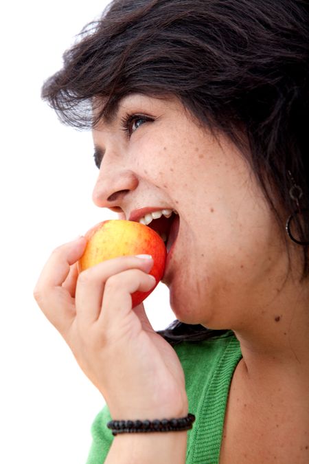 Woman eating an apple isolated over white