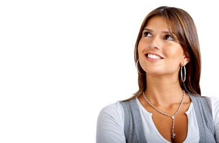 Beautiful pensive woman smiling isolated on white