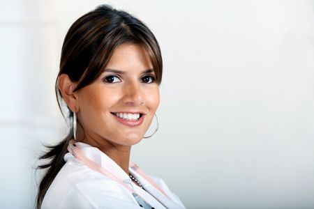 Portrait of a beautiful female doctor smiling