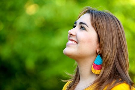portrait of a beautiful woman smiling outdoors