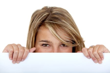 Woman covering her face with a banner isolated