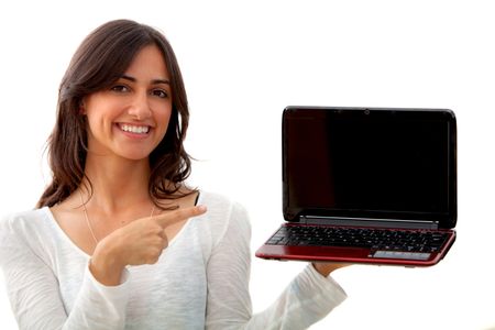 Woman displaying a laptop isolated on white