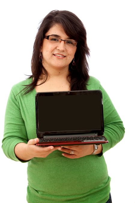 Woman displaying a laptop isolated over white
