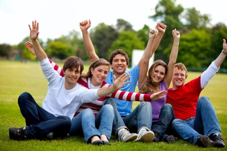 Happy group of friends at the park