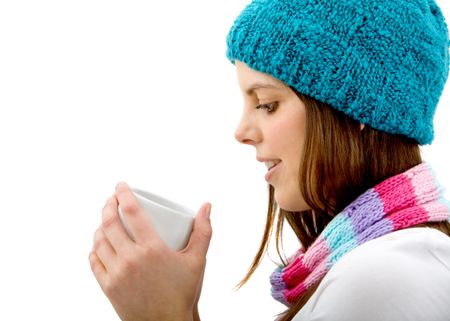 Winter woman with a hot drink isolated