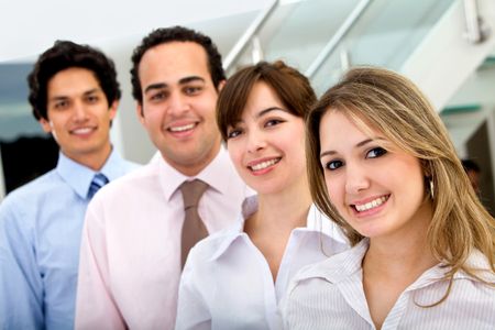Group of business people smiling at an office
