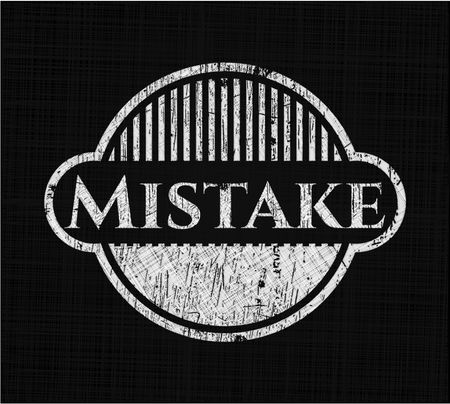 Mistake chalk emblem written on a blackboard