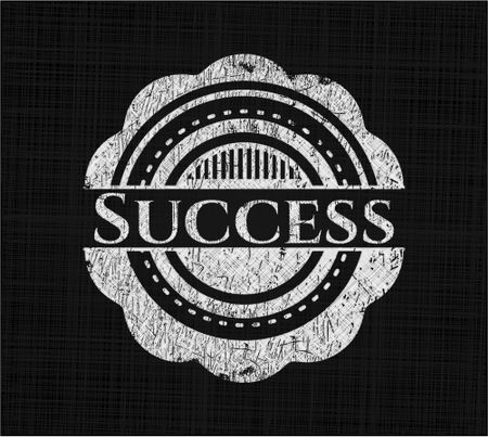 Success chalkboard emblem on black board