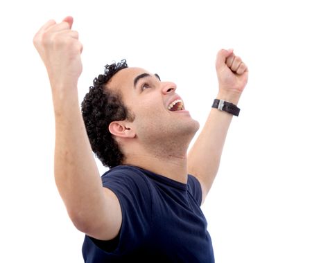 casual man with his arms up representing his success isolated over a white background