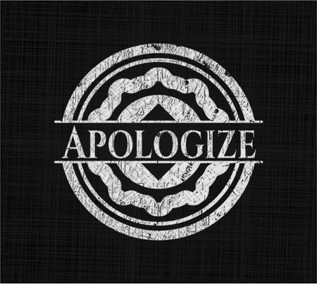 Apologize written on a chalkboard