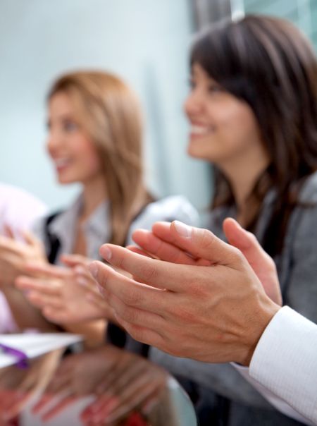 business team clapping a good presentation in an office