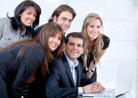 Business people on a laptop in an office