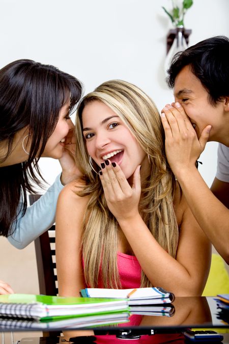 Group of friends studying and gossiping at home