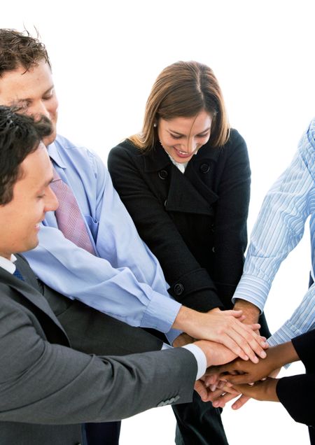 business team with their hands together isolated over a white background