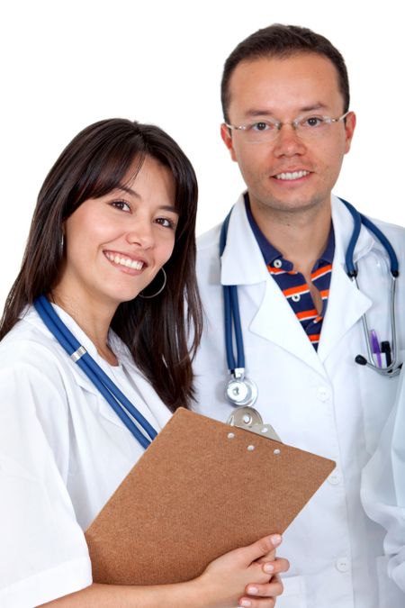 Couple of doctors smiling isolated over a white background