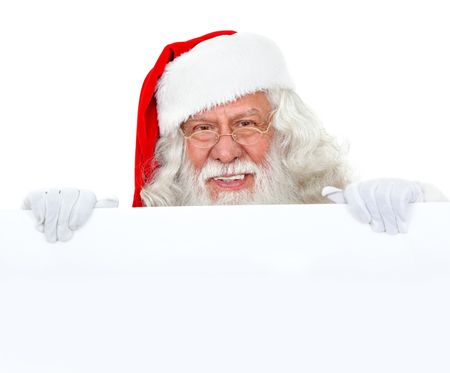 Santa Claus with a Christmas banner isolated over white