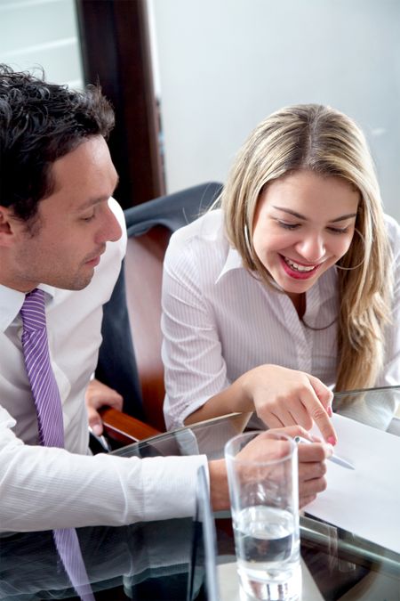 Business couple in a corporate meeting at the office