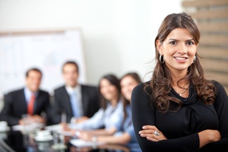 Beautiful business woman smiling at the office