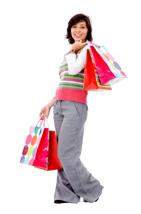 Woman shooping with paper bags isolated on white