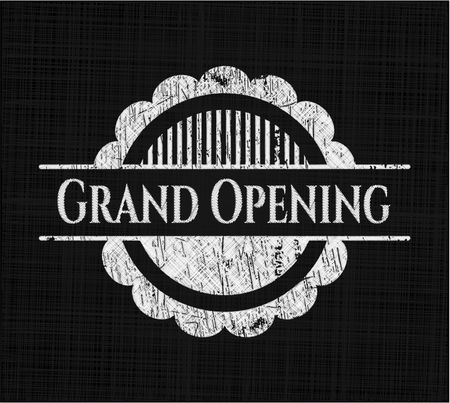 Grand Opening chalkboard emblem written on a blackboard