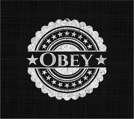 Obey written on a chalkboard