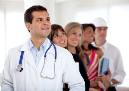 Beautiful happy people with different professions indoors