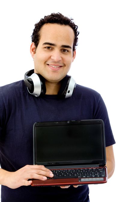 Man with laptop and headphones isolated over a white background