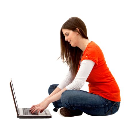 Casual woman working on a laptop isolated