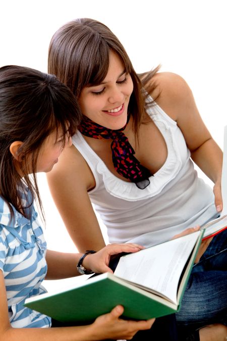 Two female students studying isolated over white