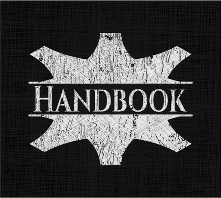 Handbook chalk emblem written on a blackboard